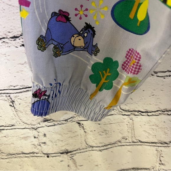 DISNEY Womens Eeyore Roller Speedway Long Sleeve Scrub Top Blue Size Large - Picture 3 of 9
